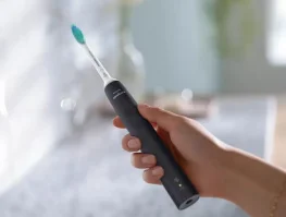 Фото электрическая звуковая зубная щетка philips sonicare 3100 series hx3671/14